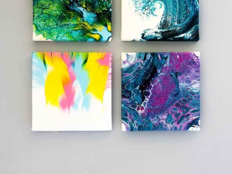 multicolored abstract 4-panel painting set on white surface