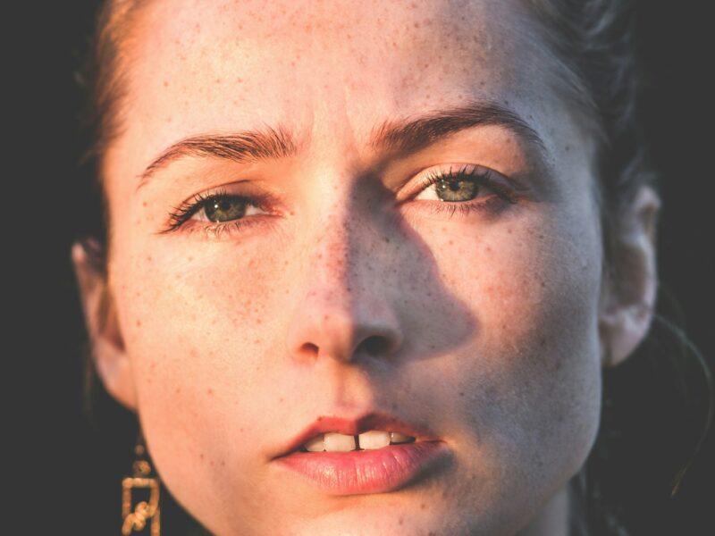 sun rays of woman's face