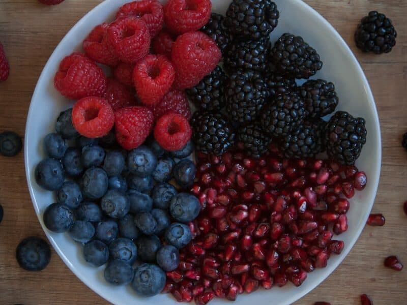 strawberries on white ceramic bowl